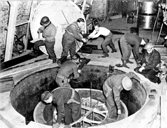 T-Force members dismantling a seized German nuclear reactor.